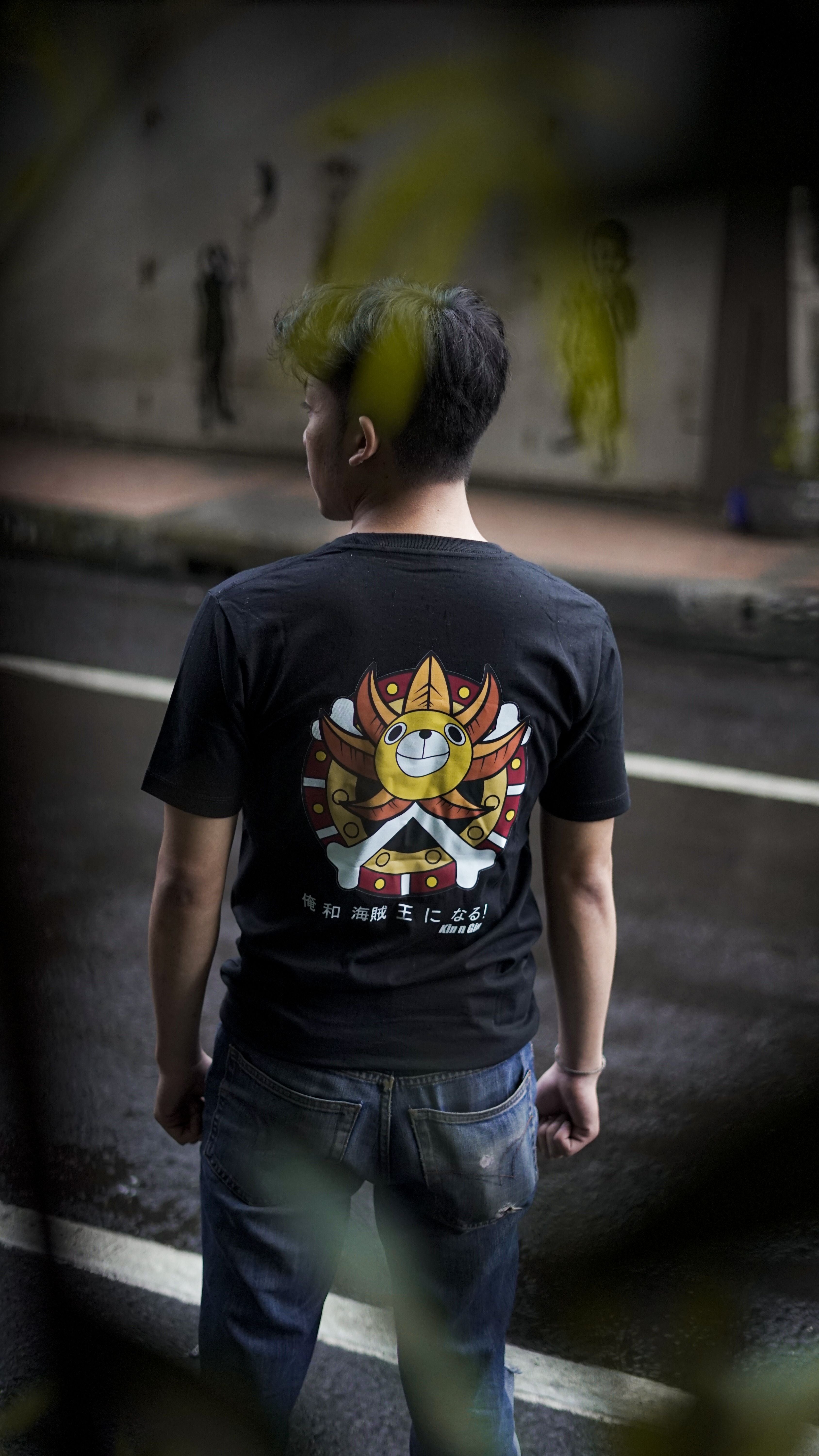Sun Pirates black anime streetwear tee back view outdoor